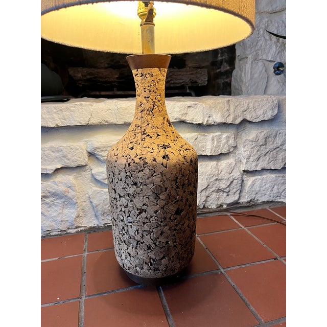 Really great Midcentury lamp made of cork with original shade! Works with no issues.