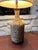 Really great Midcentury lamp made of cork with original shade! Works with no issues.