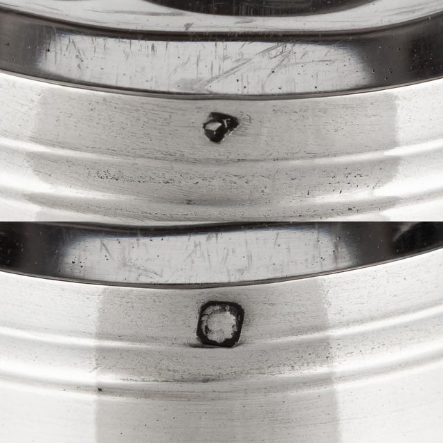 A stunning 20th Century French solid silver & cut glass decanter. Featuring a decagonal shape with a silver rim. This fine...