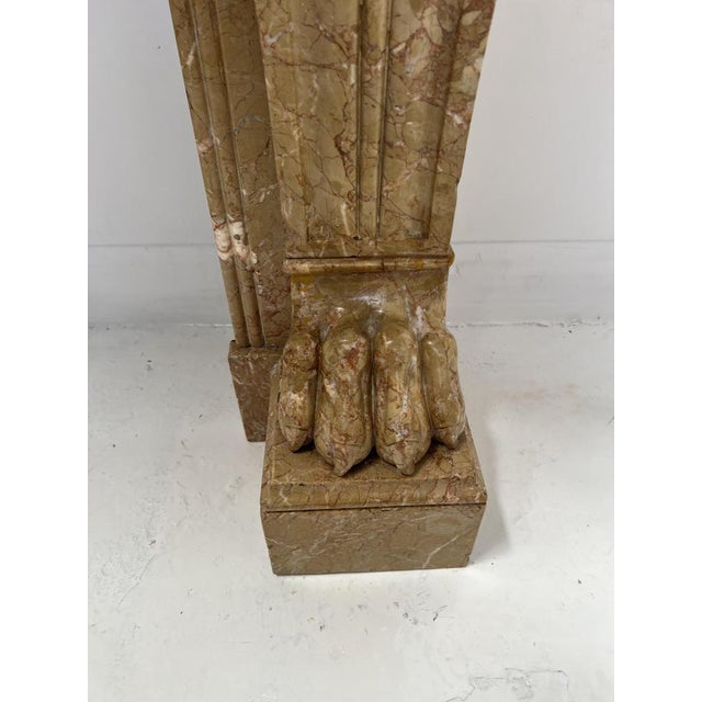 Napoleon iii fireplace with claw feet in speckled marble two console-style jambs decorated with recessed fluting and claw...