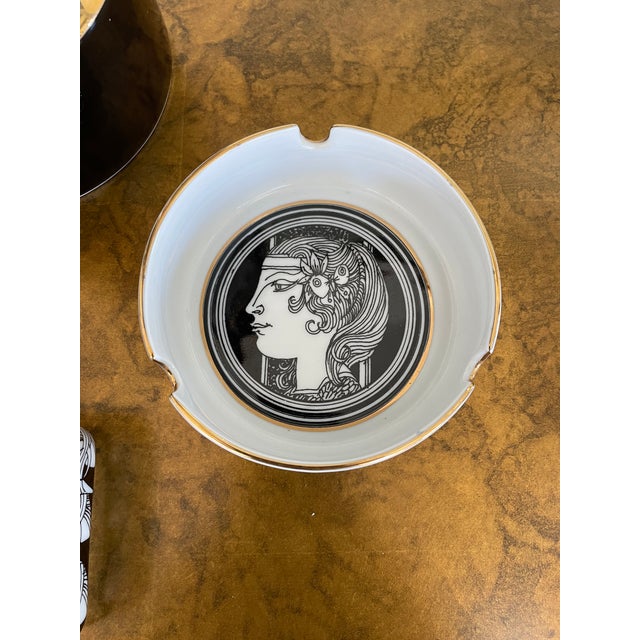 An exquisite grouping by Endre Szasz for Hollóháza. The vase features a sun, moon and goddess 6.25"W x 12"T The boxes and...