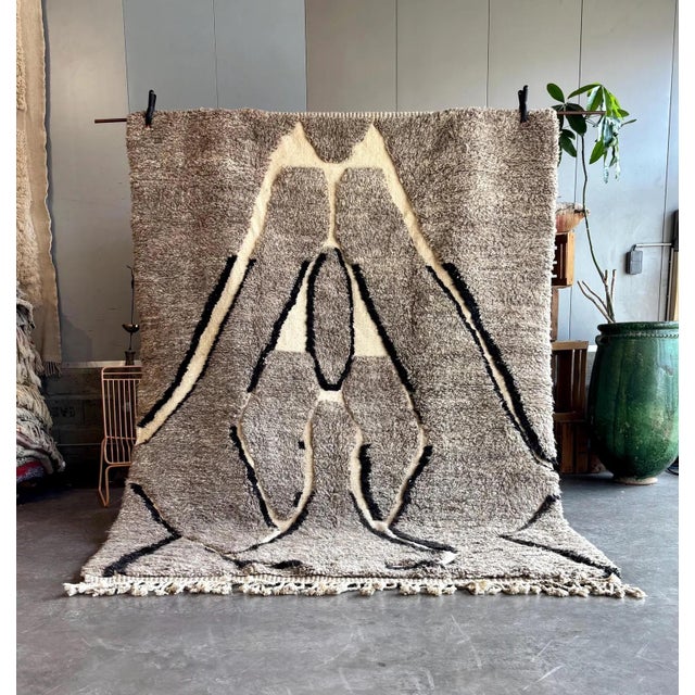 Bring warmth, elegance, and authenticity into your home with this Moroccan Mrirt Rug, handwoven in Morocco using premium...
