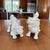 Beautiful pair of white porcelain "Blanc de Chine" Foo or Shi Dogs by Fitz and Floyd Both are numbered on the bottom F 22/31