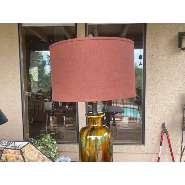 I purchased this lamo about 15 years back in time. Mid Century furnishing are my thing. You will love this gorgeous lamp....