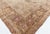 The antique Indian Agra rug dating back to circa 1900. Its main field displays a faded grid of palmettes and vines. The...