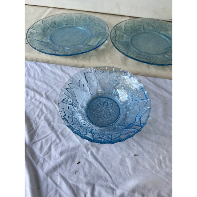 Up for consideration is a set of blue glass detailed plates. These would look lovely in your home and they are a great...