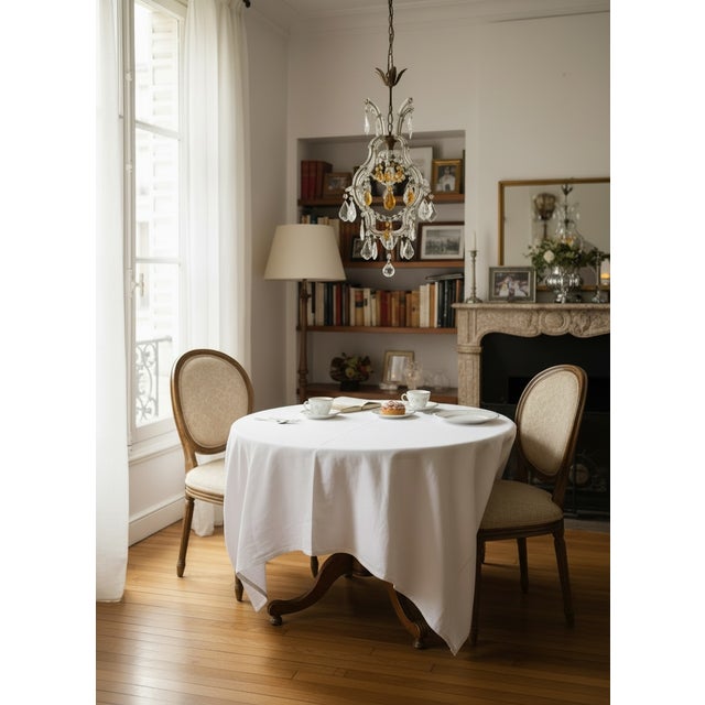 This elegant mid-century single-light chandelier captures the lighter, graceful style of classic Italian lighting design....