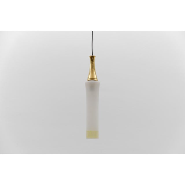 Lovely cylindrical glass hanging lamp with brass, mid-century modern, germany fantastic 1950s glass with a yellow pattern...