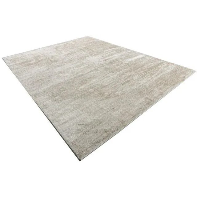 New contemporary rug. In taupe ivory a new rug of the highest quality hand loomed in viscose.
