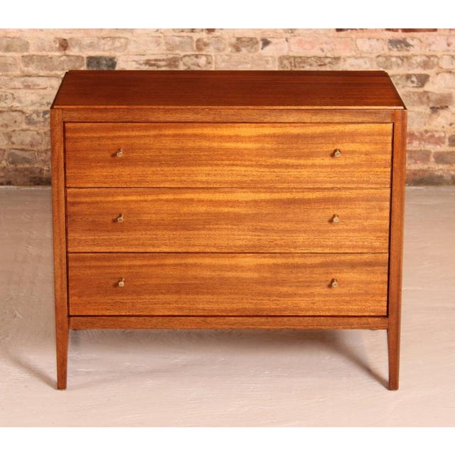 Mid Century mahogany chest of drawers with brass handles by Loughborough Furniture for Heal's, circa 1960s. Excellent...
