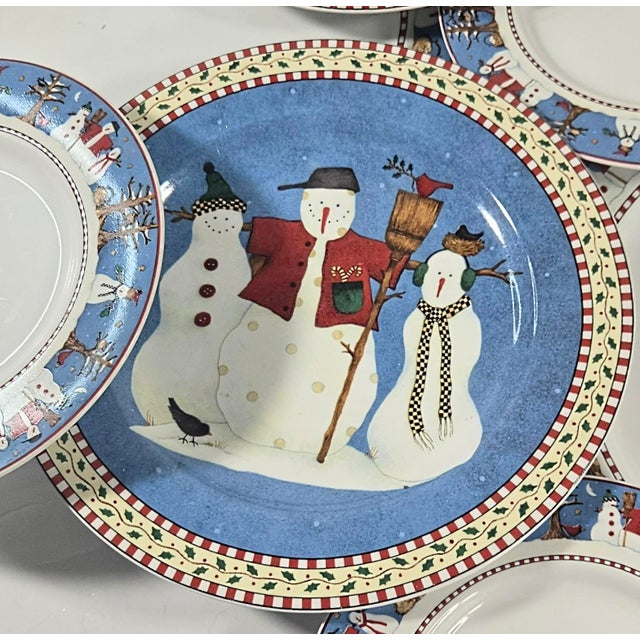 Debbie Mumm, folkart extraordinaire of the 90s brought these brilliant snowman drawings to life on china. There's eight...