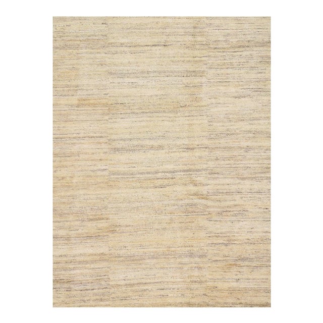 This is a gorgeous Persian Gabbeh rug. It's been hand-knotted using hand-spun lamb's wool. The rug has a dense, soft pile,...