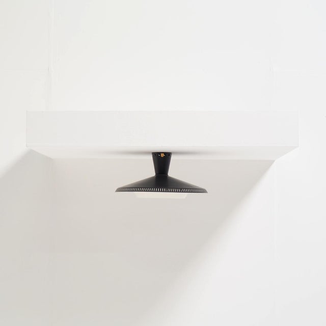 This philips nb 93 flush mount quietly brings the spirit of the 1950s into your home. that era’s renewed sense of freedom...