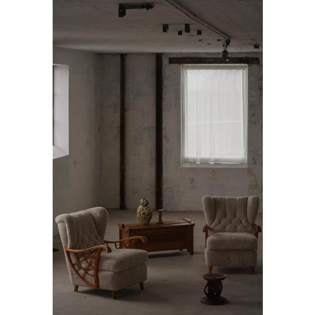 A beautiful pair of Swedish Modern lounge chairs, originally crafted in Sweden in the 1930s–1940s, this set has been...