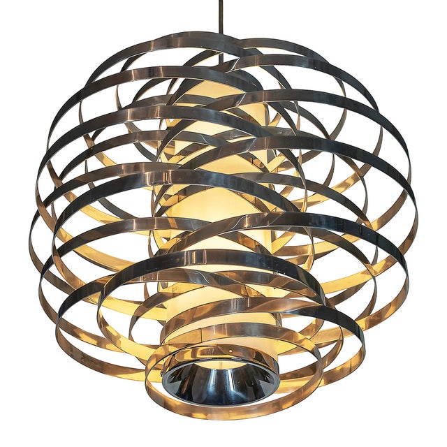 Italian mid-century "cyclone" chandelier by sciolari from 1970s. the chandelier is made in aluminium with acrylic glass...
