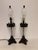 Add a touch of classical elegance to your space with this striking pair of 1980's table lamps. Designed in the...