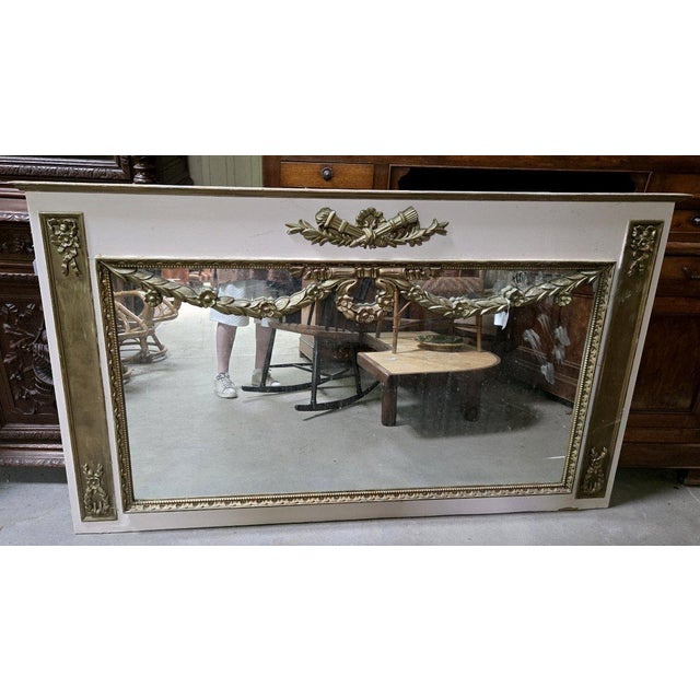 Very large Louis XVI style painted wood panelled trumeau Gilded wood relief carvings