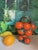 Hand-glazed Spanish gargoulette — traditional ceramic water pitchers from southern Spain — shaped as a clementine open in...
