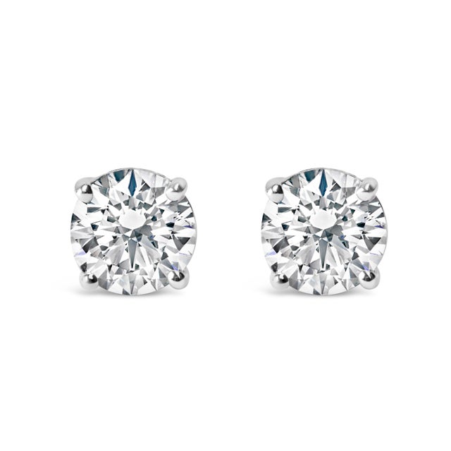 For the poised woman who values everlasting allure, these solitaire diamond studs stand as the pinnacle of sophistication....
