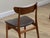 Elevate your dining space with this exquisite set of six authentic Danish Mid-Century Modern dining chairs, designed by...