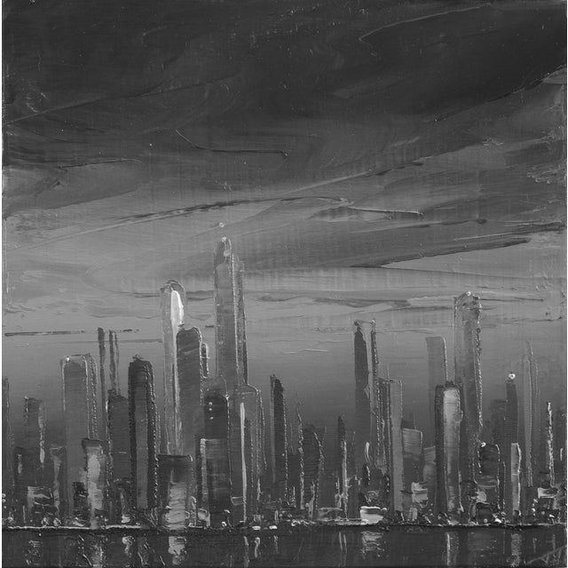 This oil on board artwork presents a striking monochromatic cityscape, where towering structures rise against a dramatic,...