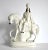 An antique, 19th-century Staffordshire ceramic figurine or statuette of a Scottish rider or hunter on a white horse, with...