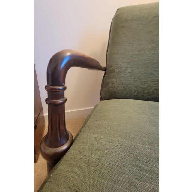 This classic Morris chair, the first chair designed to recline at intervals, features unattached, deep seat and back...