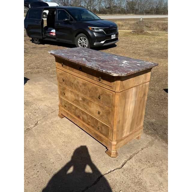 19th Century French Louis Philippe Commode from France. Made of Burl walnut, with a Saint Anne marble top slab, the wood...