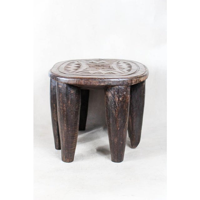 Nupe stool - this is a large fabulous hand carved wood stool from the nupe people of nigeria. These stools are hand carved...