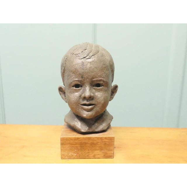Artist’s Model Bust of a Very Young Smiling Boy This very attractive Artist’s Model Bust of a Very Young Smiling Boy is...