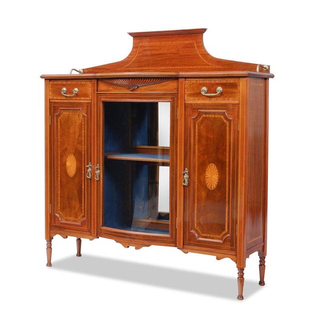 Small display cabinet, England, Edwardian, circa 1900 Mahogany, finest inlay work Center section lined with blue velvet,...