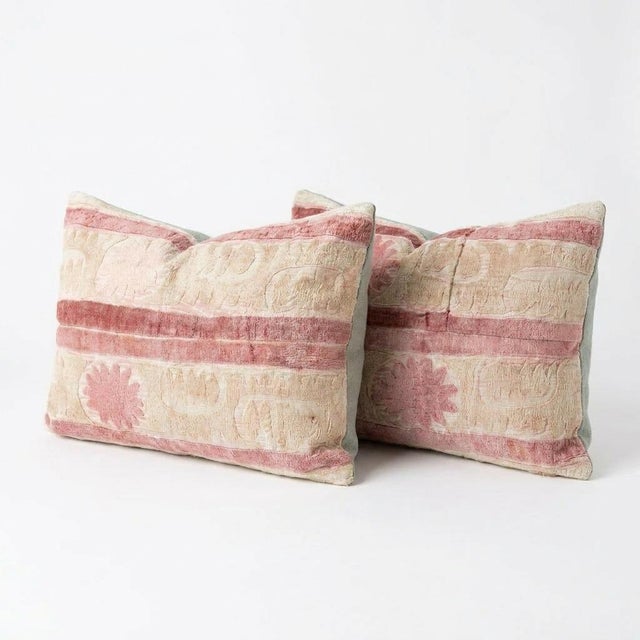 This beautiful 17'' x 24'' hand-embroidered Suzani pillow cover set was made from authentic Uzbek cotton fabric. The...