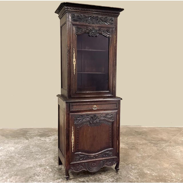 19th Century Country French Two-Tiered Vitrine is a marvel of the furniture maker's art! Hand-crafted from dense, old-...