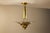 A calm and well-balanced design, this hanging lamp shows the clarity typical of early french art deco lighting. The...