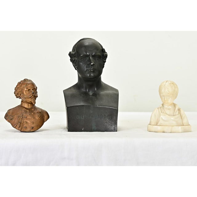 Dimensions: 9” H x 5 ⅝” W x 4” D A curious assortment of vintage busts in bronze and alabaster. The largest bust, cast in...