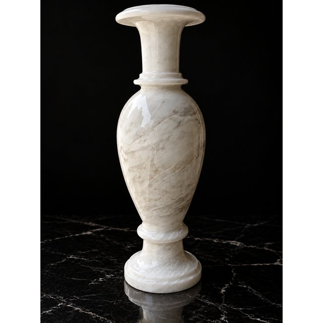 Bring timeless elegance to your space with this Ziarat White Marble Vase, expertly handcrafted from natural marble sourced...