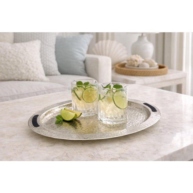 A beautifully crafted vintage oval serving tray designed and manufactured in Taxco, Mexico by Emilia Castillo, one of the...