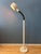 Striking mid-century space age cobra floor lamp featuring a sculptural gooseneck design. The adjustable gooseneck arm...