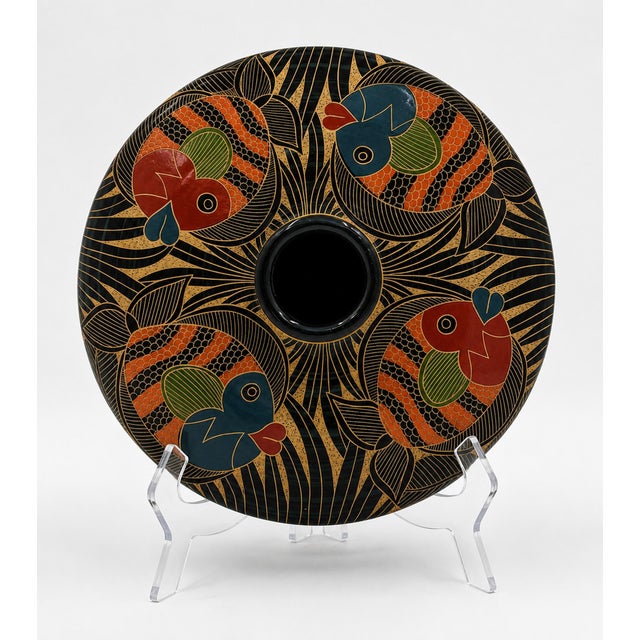 A striking hand-thrown and hand-decorated ceramic bud vase by Nicaraguan master ceramicist Pedro Guerrero of San Juan de...