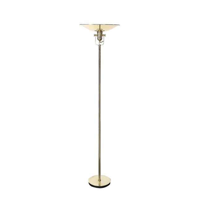 This elegant pair of Mid-Century Modern torchieres by Nessen Studios exemplifies the studio's renowned attention to detail...