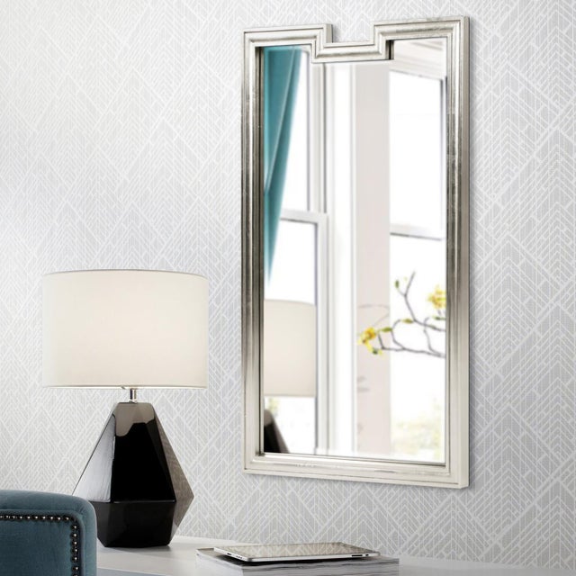 The Danube Mirror is a gorgeous piece with an Art Deco flair. It features a simple rectangular wood frame with a notch cut...