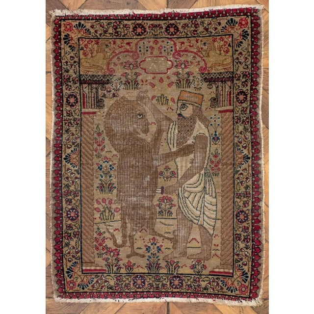 rug depicting a Pasargadae, a Hachamaman soldier fighting a lion. Wool on cotton warp. Provenance: Middle East. Date:...