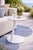 Serene tables add a clean, modern touch to any space. The slim side table features an angled metal base and a marble-style...