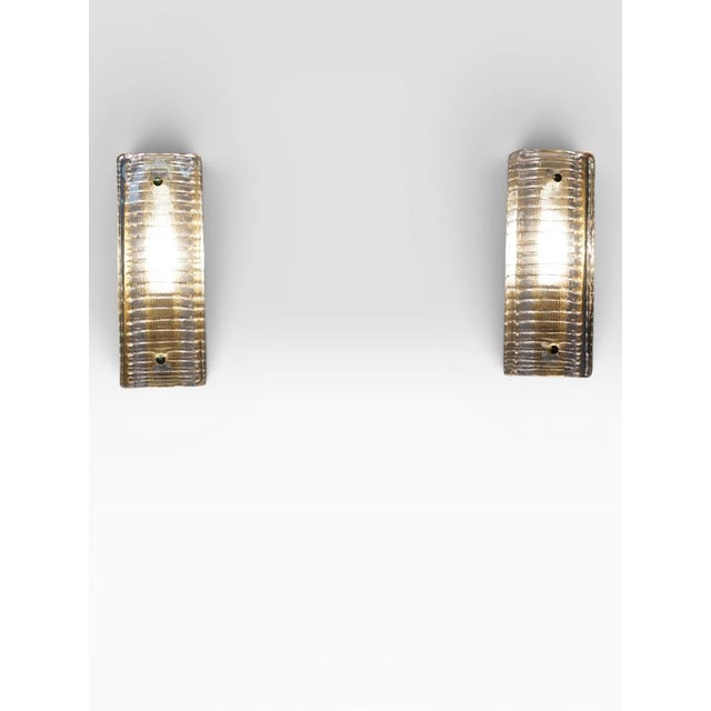 A beautiful pair of Mid-Century Modern wall sconces, model 8971, manufactured in Northern Europe in the 1970s. Each sconce...