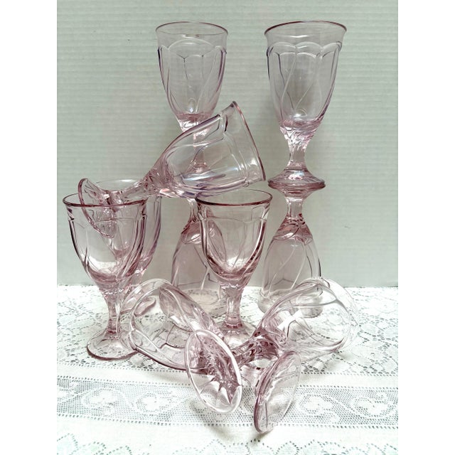 Vintage set of ten petal pink large stemware goblets with textured design. Some are a tiny bit more slender than the...