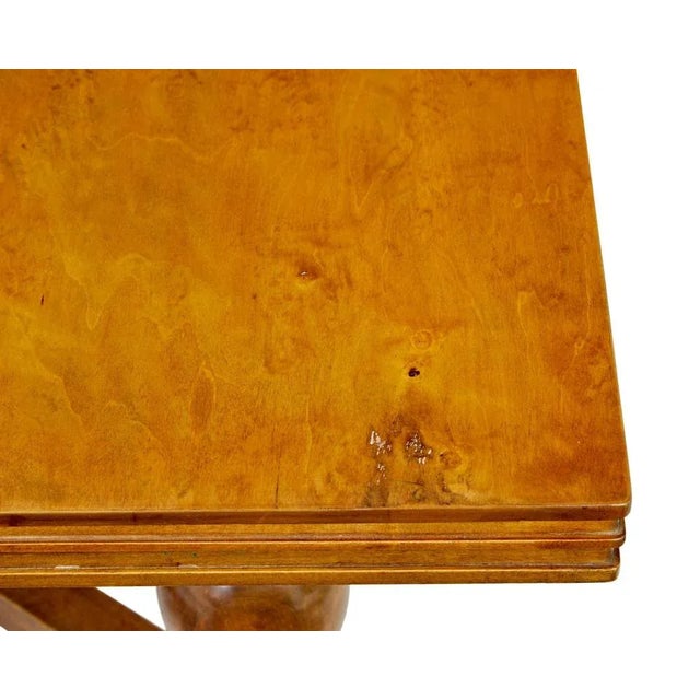 Early 20th century birch extending dining table circa 1920. Good quality Swedish made draw leaf dining table, styled in...