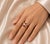 This exquisite 14K yellow gold ring combines the warm, rich tones of natural carnelian with the sparkling elegance of 20...
