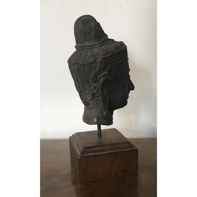 Antique Bronze Bust of Buddha Mounted on a Wood Stand For Sale - Image 9 of 11