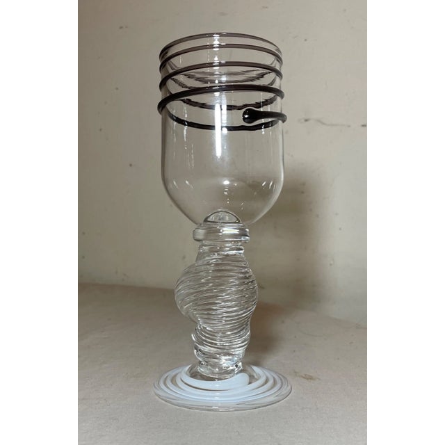 Up for sale is a wonderful vintage hand blown 5th street studio glass goblet. It's blown out of clear glass with a lovely...