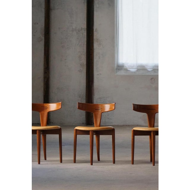 An exceptional and rare set of four “t” dining chairs designed by erik andersen and palle pedersen for randers...